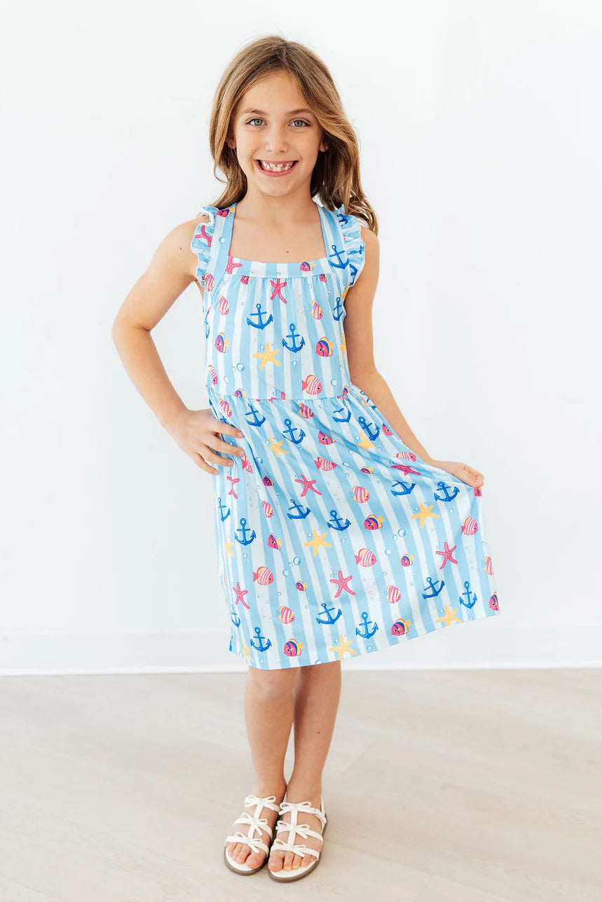 TIDEPOOL TREASURES RUFFLE CROSS BACK DRESS